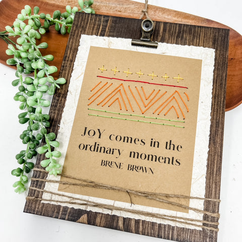 Ordinary Moments Stitched Picture Sign