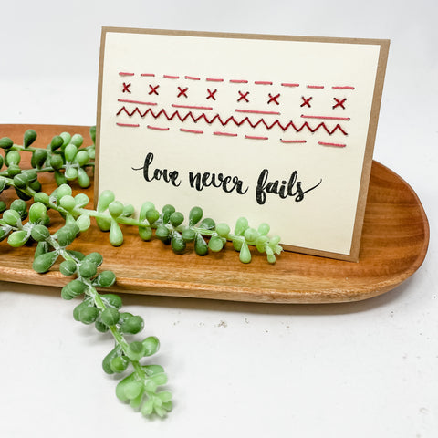 Love Never Fails Greeting Cards